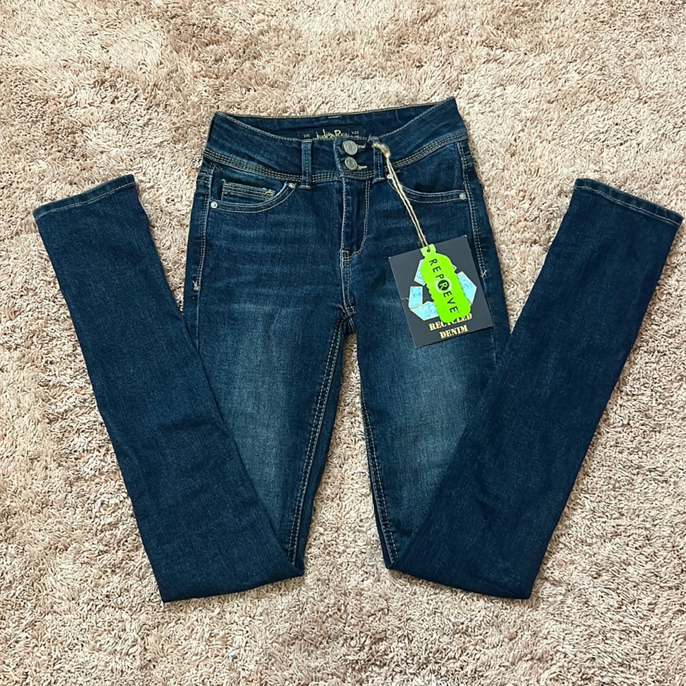 Dark wash recycled demin jeans. Mid rise